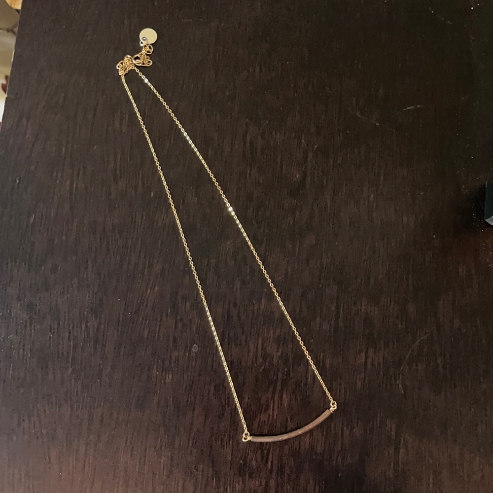Gold chain necklace with silver bar